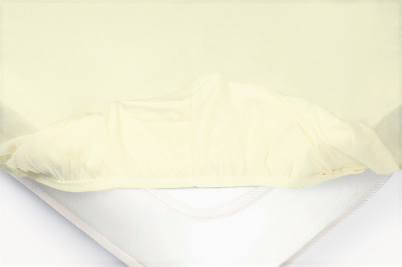 Детская простыня на резинке Трикотажная нежно-желт