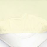 Детская простыня на резинке Трикотажная нежно-желтая